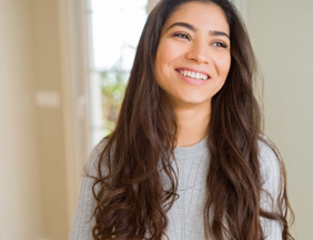 Closeup of woman smiling at home