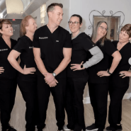 The staff of Dr. Davis Dentistry, featuring Anthony Dillard, DDS, stands united in a friendly and inviting dental environment.
