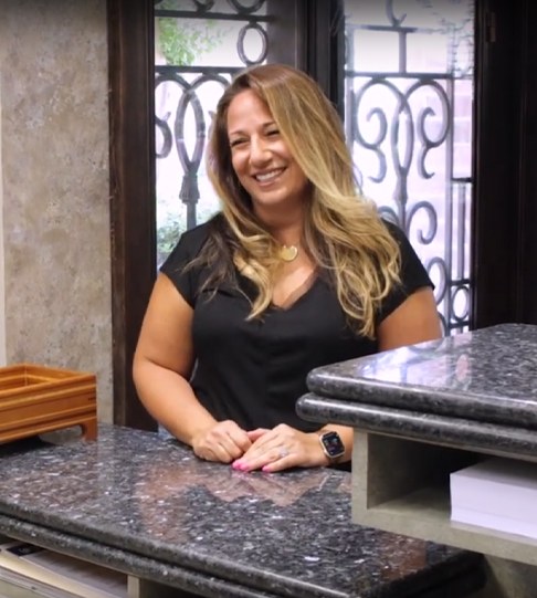 Carrollton dental patient Sherry at front desk in dental office