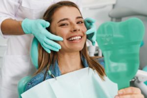 a closeup of a patient receiving veneers in Carrollton