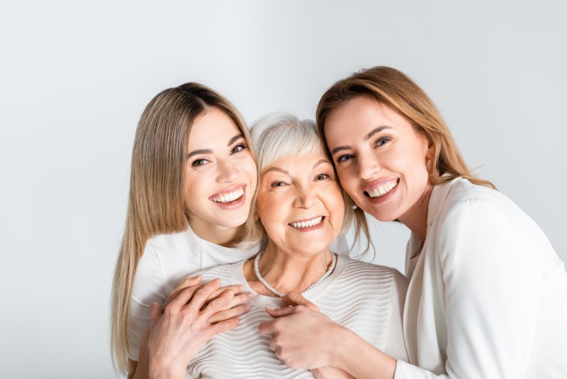 a family of women smiling together