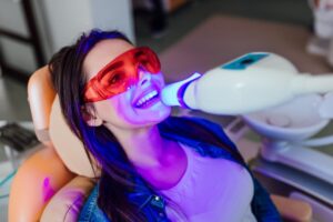 Patient having their teeth whitened. 